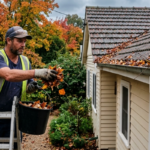 Tradesperson clearing leaves during gutter cleaning in Braddon on an established Canberra home before heavy rain